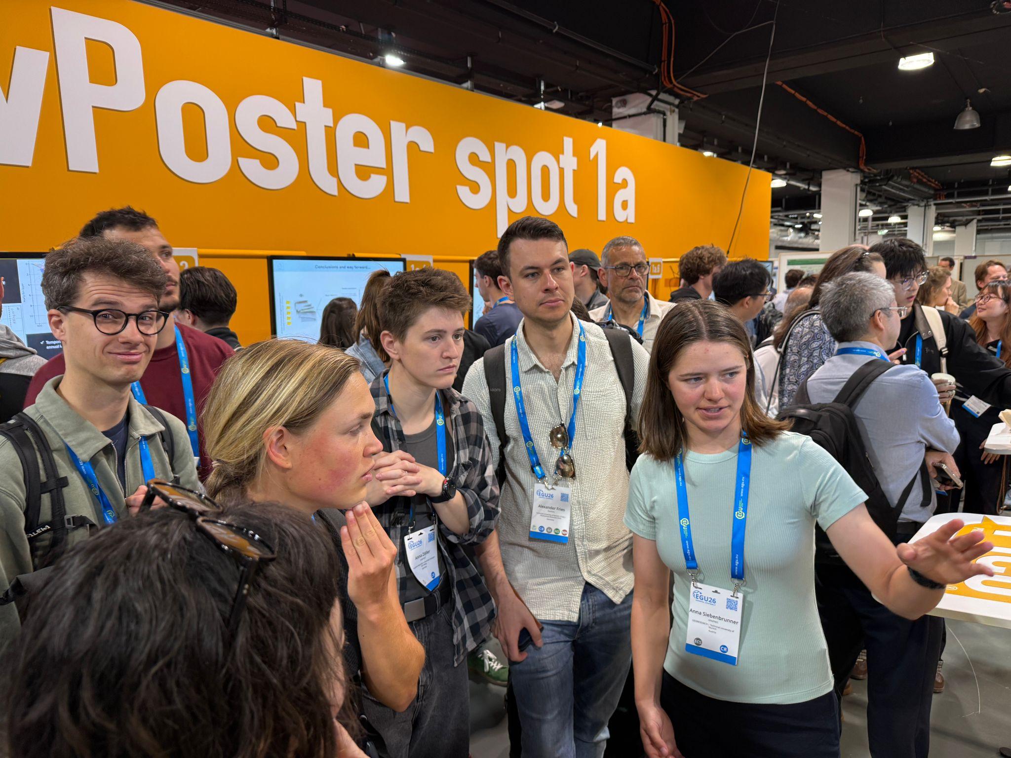 Anna Siebenbrunner explaining her research to fellow scientists at the EGU General Assembly 2026